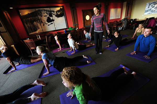Stay in shape for the slopes with a yoga for skiers class at Aspen/Snowmass. Photography by Jeremy Swanson