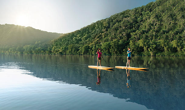 En route to a stand-up paddleboard yoga session at Lake Austin Spa resort in Austin, Texas. Photo courtesy of Lake Austin Spa Resort