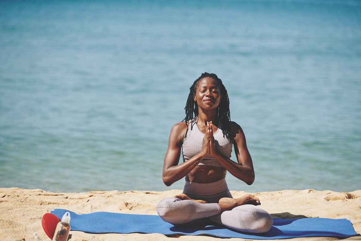 Smiling meditating woman